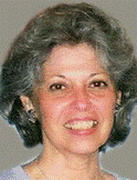 A close-up of a person smiling

Description automatically generated